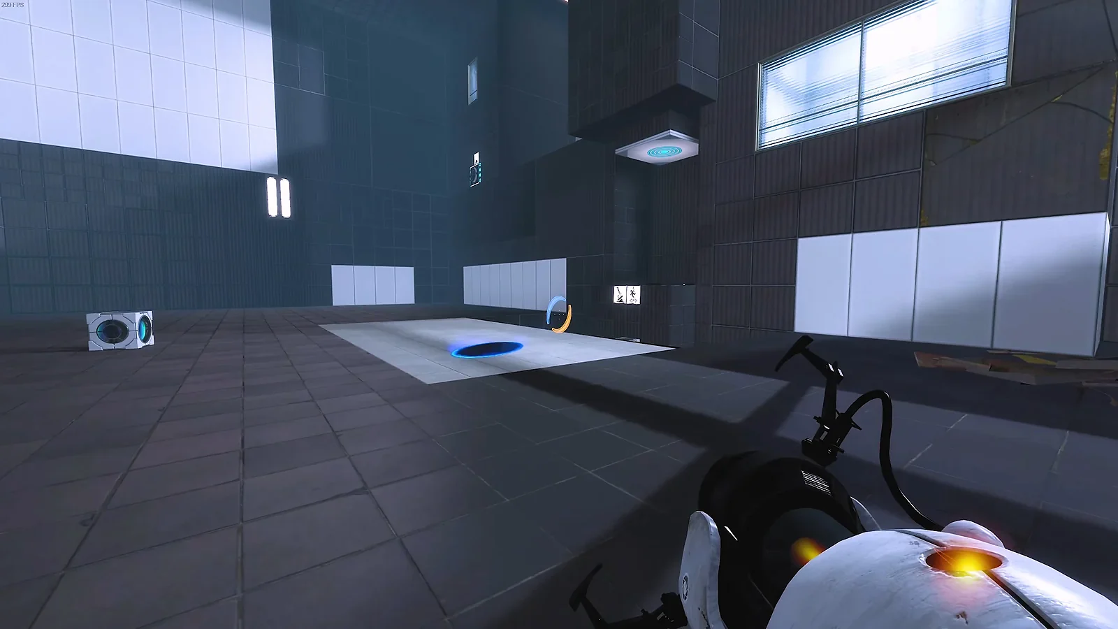 Puzzle Game: Portal 2 gameplay of a blue portal on the floor of a test chamber with the portal gun held