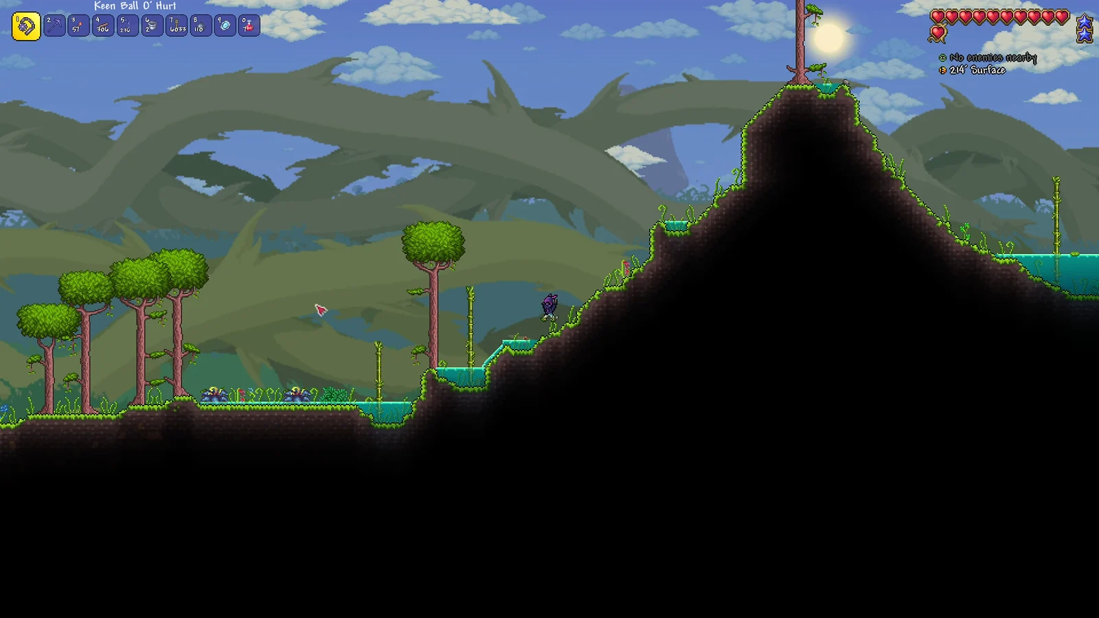 Creative Sandbox: Terraria gameplay of a 2D pixel art character traversing a hilly green surface biome with trees