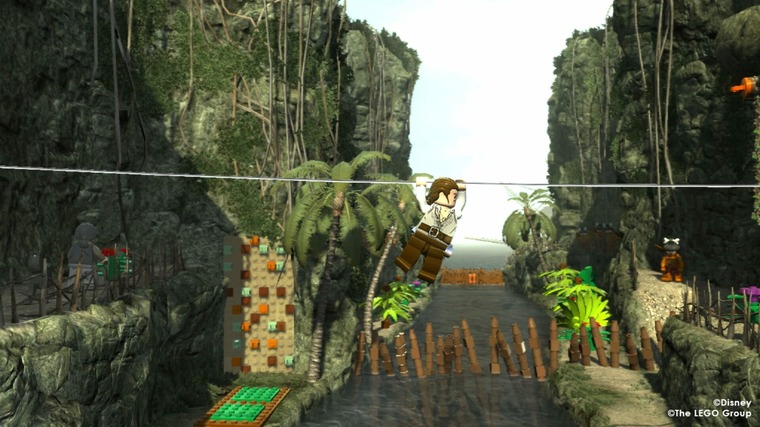 Will Turner pulls himself across a tightrope in Lego Pirates of the Caribbean: The Video Game.