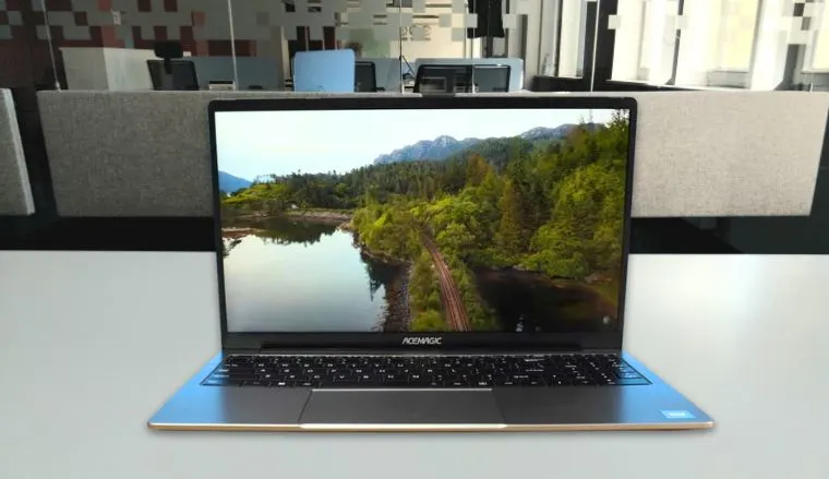 ACEMAGIC AX15 Gaming Laptop on a white office desk positioned for photography