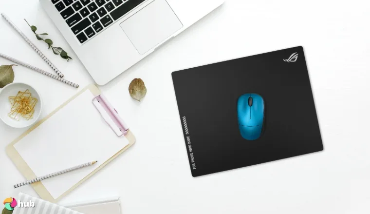 ASUS ROG NH04 Gaming Mouse Pad on a white office desk set up for testing and review