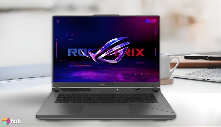 ASUS ROG Strix G16 Gaming Laptop on a white office desk with natural light ready for a review
