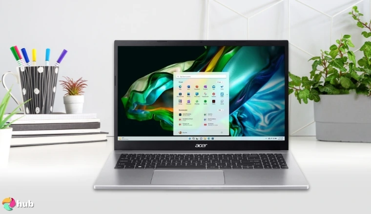 Acer Aspire AMD Ryzen 7 Gaming Laptop on a white office desk with professional arrangement for a review