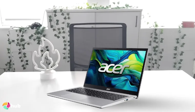 Acer Aspire Go 15G Gaming Laptop on a white office desk arranged for a review