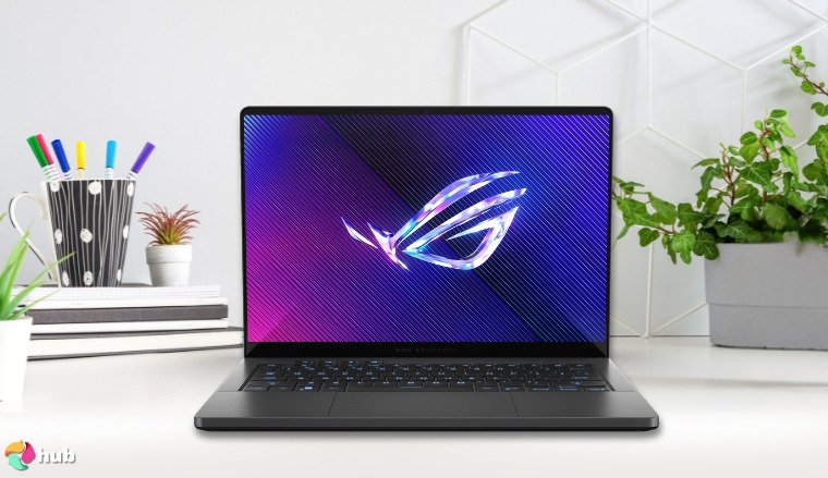Asus ROG Zephyrus G14 Gaming Laptop on a white office desk with an uncluttered background for a review