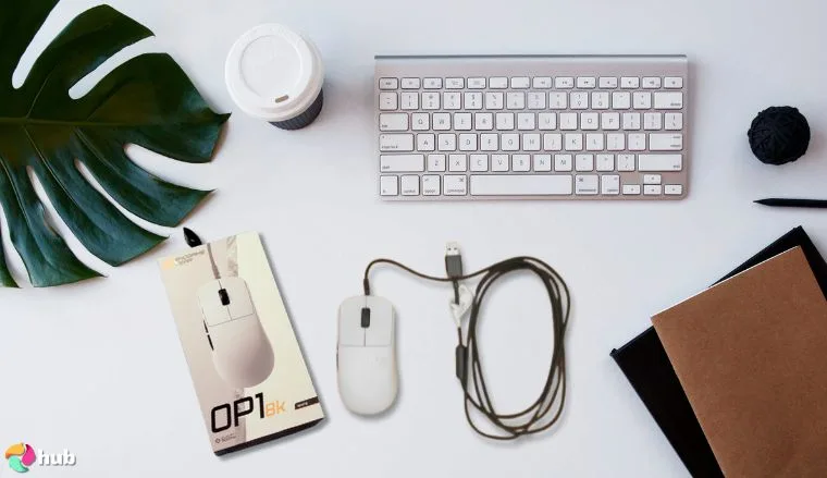ENDGAME GEAR OP1 Mouse on a white office desk in a top-down view for a review
