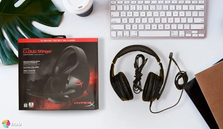 HyperX Cloud Stinger Gaming Headset on a white office desk with an uncluttered background for a review
