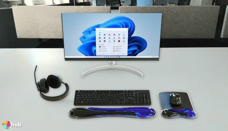 Kensington Duo Gel Wave Gaming Mouse Pad on a white office desk in a clean setup for a review