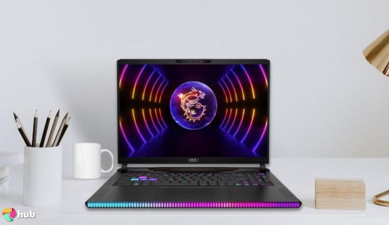 MSI Raider GE68HX Gaming Laptop on a white office desk with creative arrangement for a review