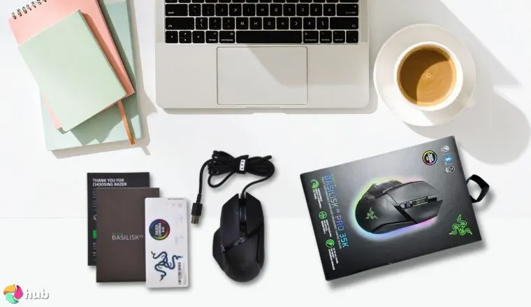 Razer Basilisk V3 Gaming Mouse on a white office desk arranged for a review