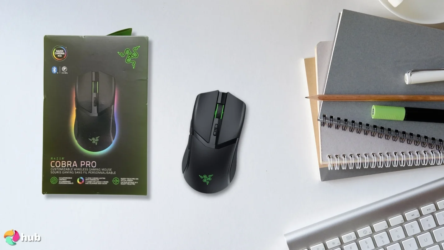 Razer Cobra Pro Wireless Gaming Mouse on a white office desk with professional arrangement for a review