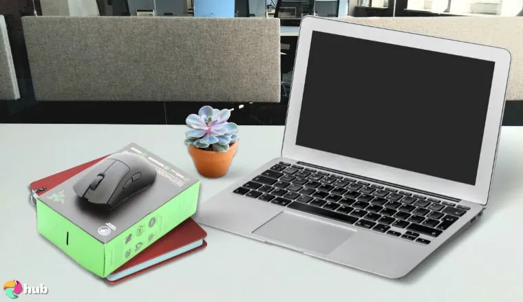 Razer DeathAdder V3 Pro Mouse on a white office desk with simple styling for a review