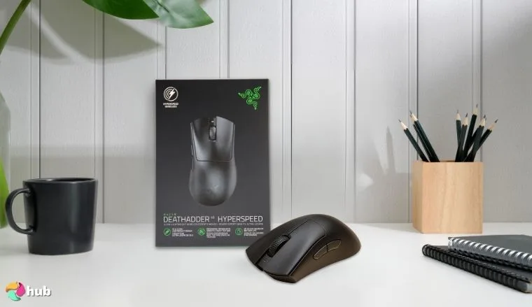 Razer DeathAdder V3 Pro Wireless Gaming Mouse on a white office desk with natural shadows for a review