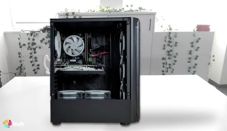 STGAubron Radeon RX 560 PC on a white office desk styled for promotional review