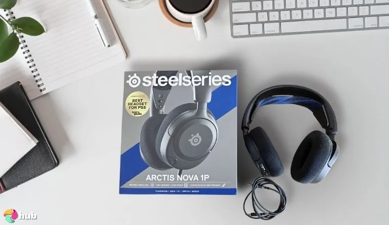 SteelSeries Arctis Nova 1 Gaming Headset on a white office desk with soft lighting for a review
