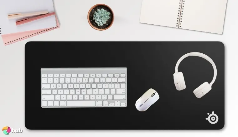 SteelSeries QcK XXL Gaming Mouse Pad on a white office desk in close-up for a review