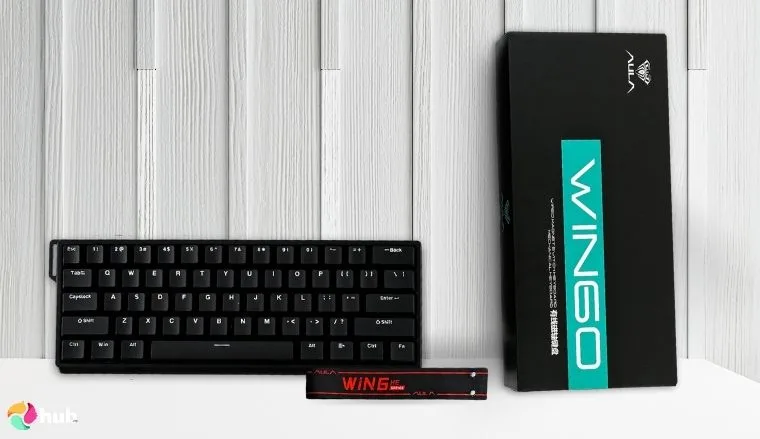 AULA WIN60 HE Keyboard on a white office desk in a bright workspace for a review