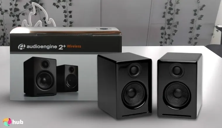 Audioengine A2+ Gaming Speakers on a white office desk with soft lighting for a review