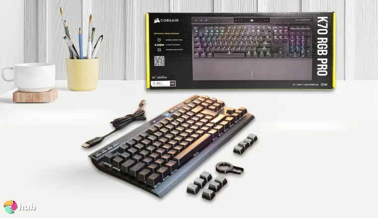 Corsair K70 RGB PRO Gaming Keyboard on a white office desk with soft lighting for a review