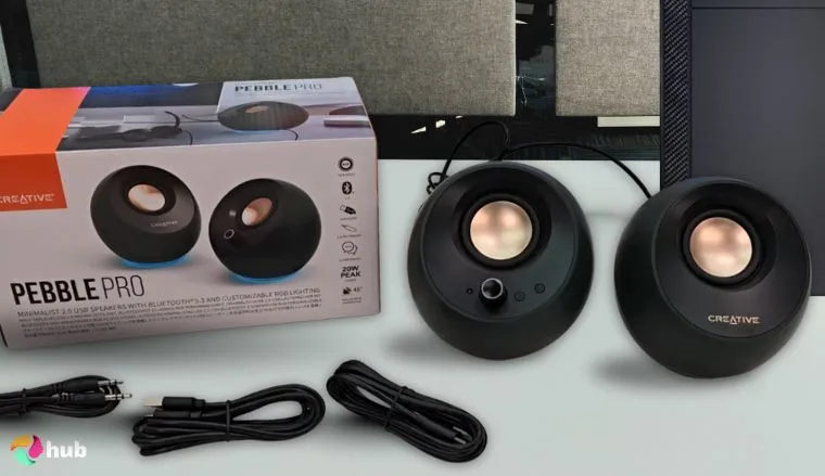 Creative Pebble Pro Computer Speakers on a white office desk in a top-down view for a review