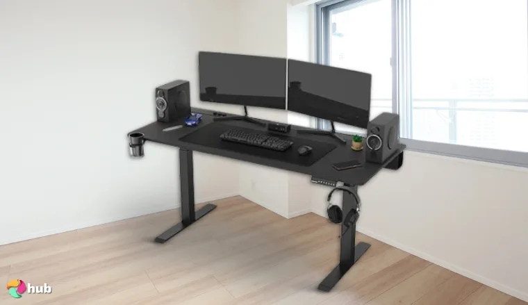 DEZCTOP Bifrost Elite Ergonomic 63 x 28 Inches Standing Desk in the bright room in a clean setup for a review