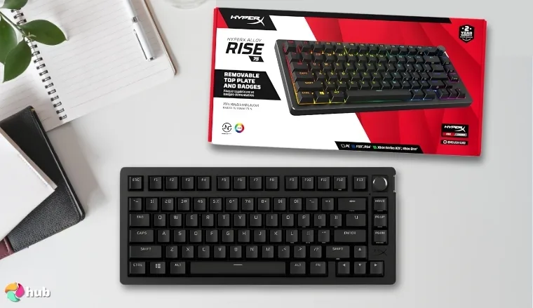 HyperX Alloy Rise 75 Gaming Keyboard on a white office desk in a well-lit setting for a review