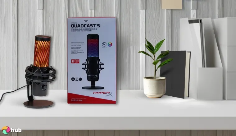 HyperX QuadCast S Microphone on a white office desk with an uncluttered background for a review