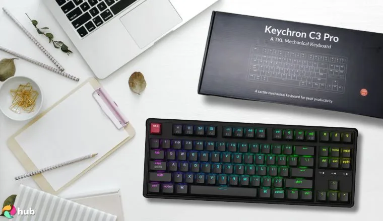 Keychron C3 Pro Gaming Keyboard on a white office desk with creative arrangement for a review