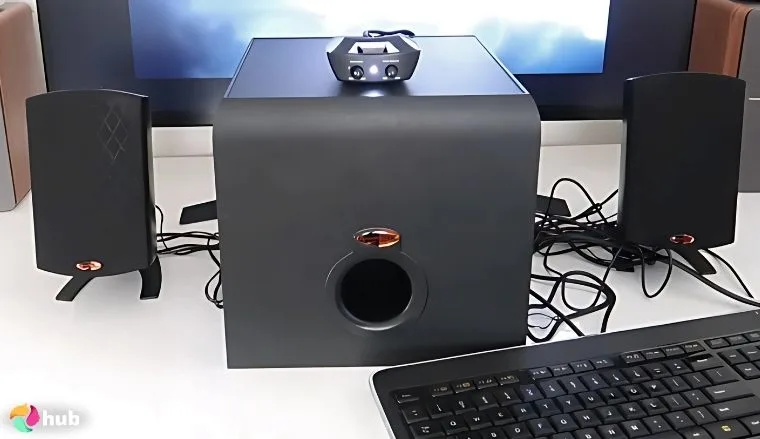 Klipsch Promedia 2.1 Gaming Speakers on a white office desk set for a professional product review