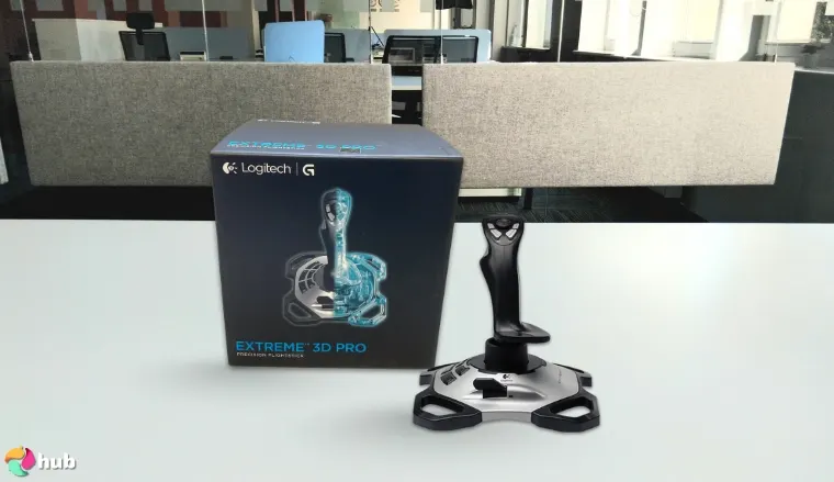 Logitech Extreme 3D Pro Joystick on a white office desk styled for a review
