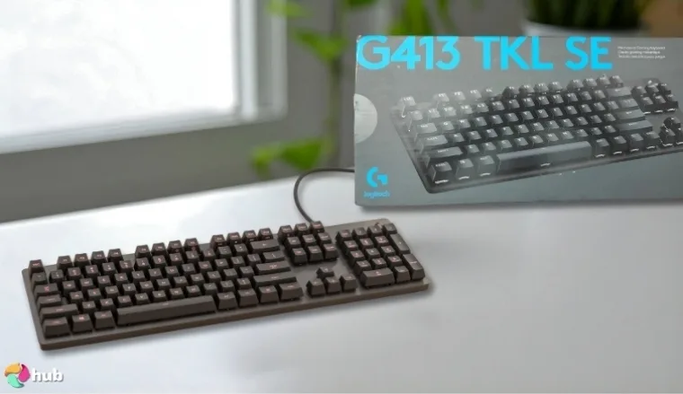 Logitech G413 SE Gaming Keyboard on a white office desk positioned for photography