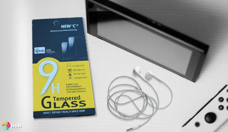 NEW’C 3 Pack Screen Protector on a white office desk in a top-down view for a review