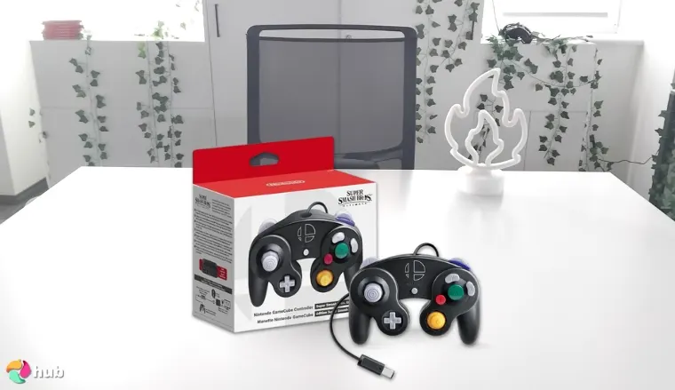 Nintendo GameCube Controller on a white office desk photographed for a review