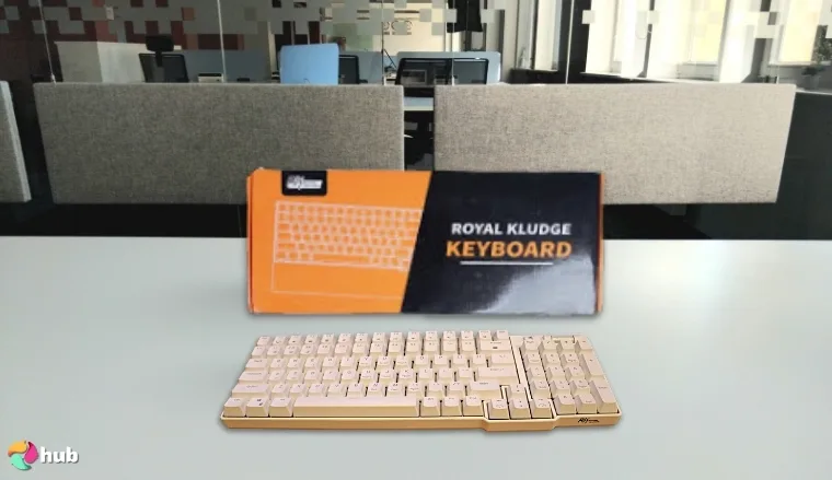 ROYAL KLUDGE RK96 Gaming Keyboard on a white office desk with soft lighting for a review