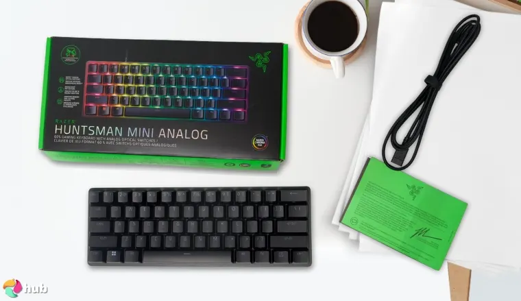 Razer Huntsman Mini Keyboard on a white office desk with creative arrangement for a review
