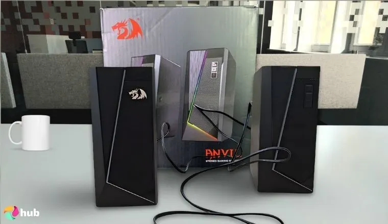 Redragon GS520 Anvil Gaming Speakers on a white office desk styled neatly for a review