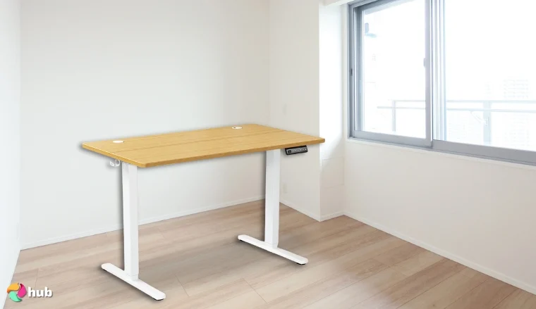 SMUG Adjustable Height Electric Sit Stand Up Down 63×24 Inch Standing Desk in an empty room