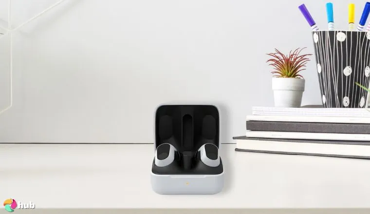 Sony INZONE Buds on a white office desk with professional arrangement for a review