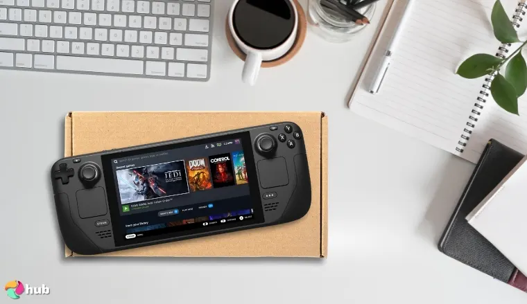 Steam Deck LCD Gaming Console on a white office desk in a top-down view for a review