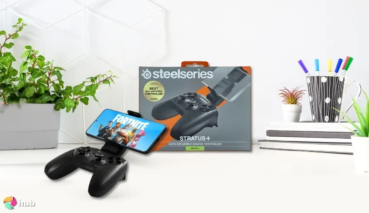 SteelSeries Stratus+ Mobile Controller on a white office desk in a well-lit setting for a review