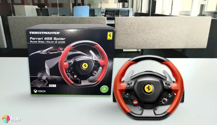 THRUSTMASTER Ferrari 458 Xbox Racing Wheel on a white office desk in a minimalist setup for a review