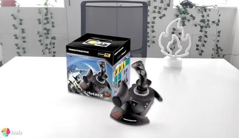 Thrustmaster T-Flight Hotas X Joystick on a white office desk prepared for testing shots