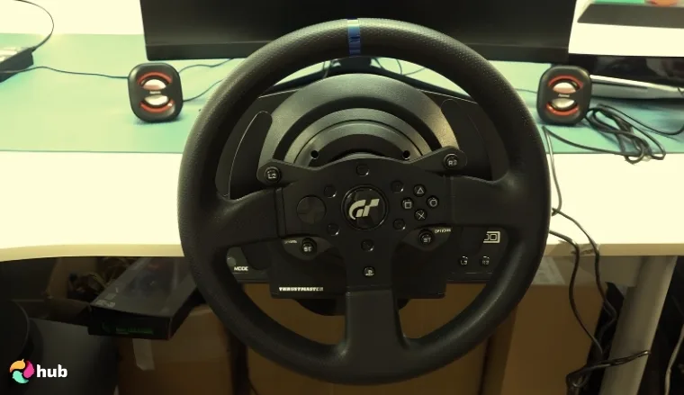 Thrustmaster T300 RS GT Racing Wheel in the gaming room in close-up for a review