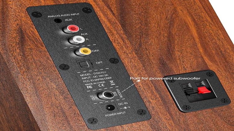 A speaker with four different types of connectivity options.