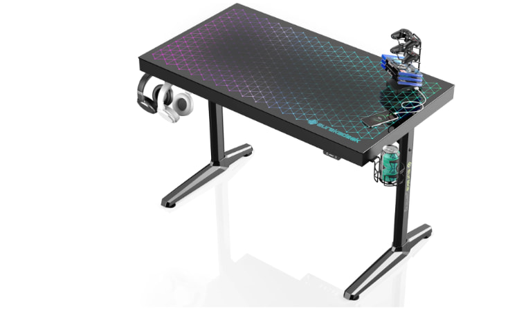 EUREKA ERGONOMIC RGB LED Gaming Desk with customizable RGB lighting and spacious surface.