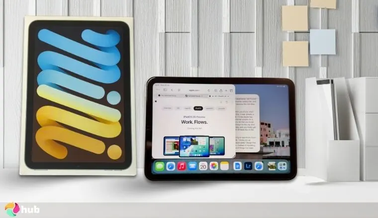 iPad Mini (A17 Pro) on a white office desk in a top-down view for a review