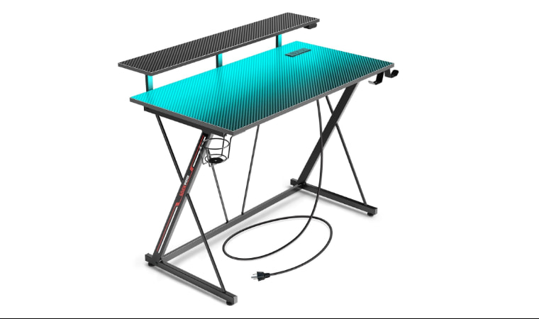 SEVEN WARRIOR Gaming Desk designed for compact spaces with built-in storage and cable management.