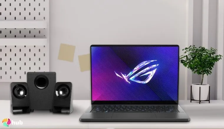 华硕 ROG Zephyrus G14 (2025) 笔记本电脑摆放在白色办公桌上,用于促销评测