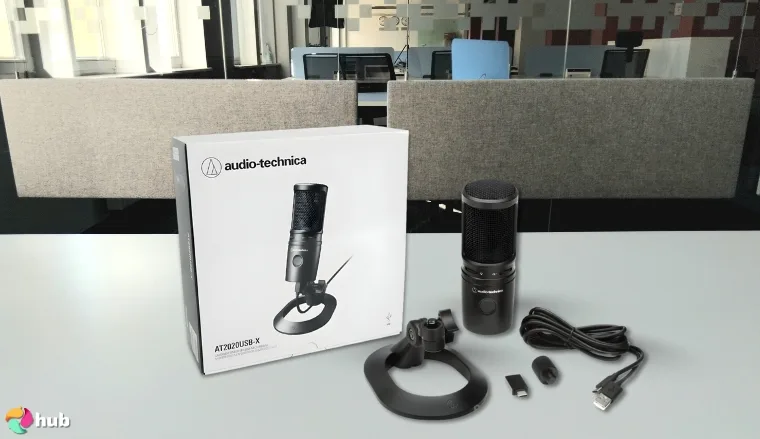 Audio-Technica AT2020USB-X USB Microphone on a white office desk styled for promotional review