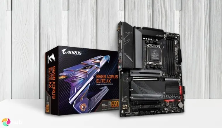 GIGABYTE B650 AORUS Elite AX Motherboard on a white office desk in a minimalist setup for a review